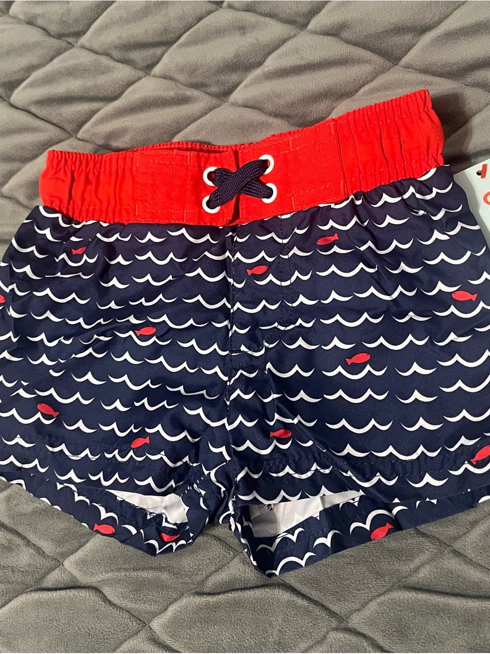 Cat & Jack Boy’s Navy Swim Trunks with Red Waistband and Fish Print